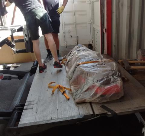 coffin ready to be put into the moving van